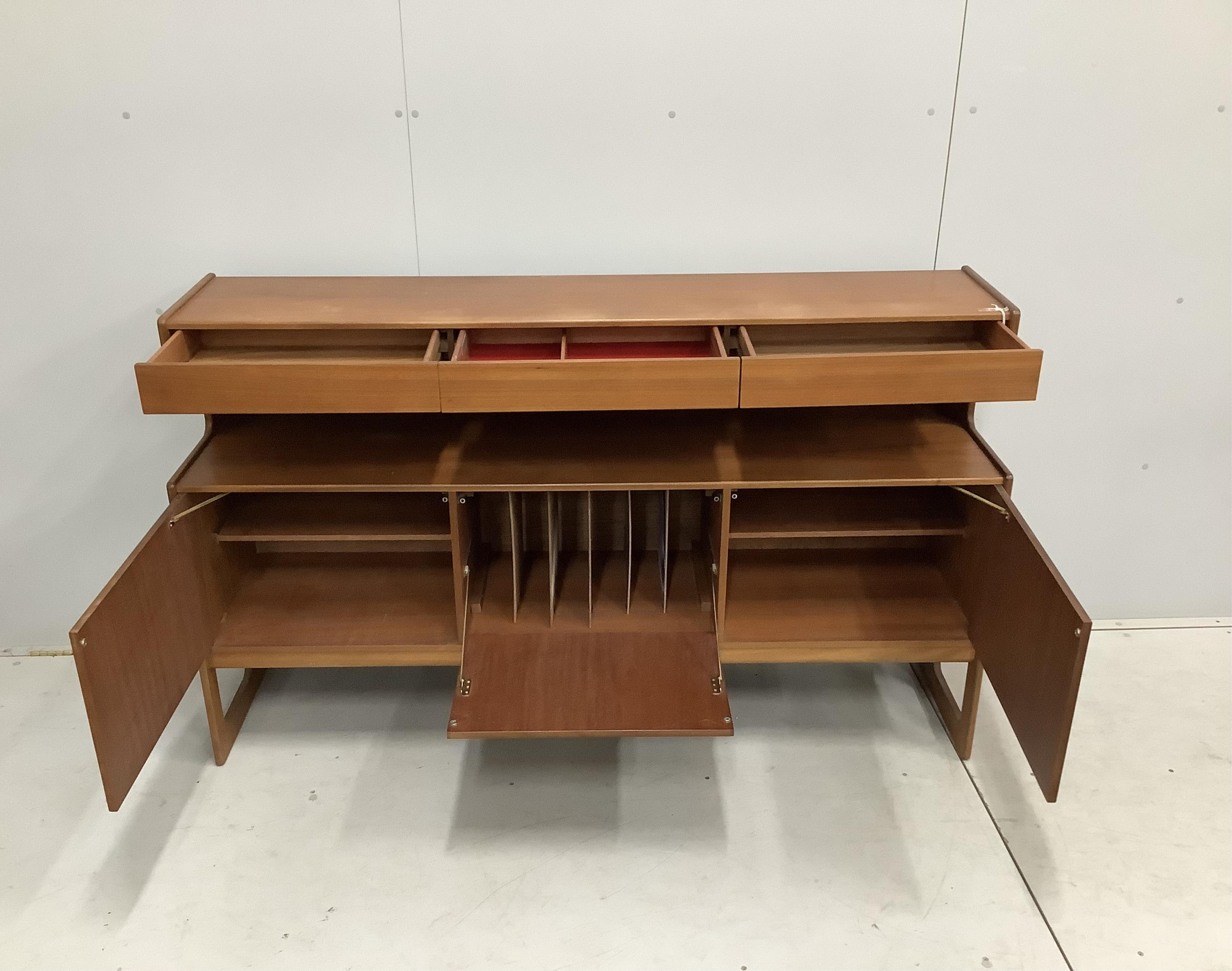 A mid century Danish style MacIntosh Forfar teak sideboard, width 170cm, depth 46cm, height 102cm together with a McIntosh teak extending dining table and four chairs teak sideboard, width 170cm, depth 46cm, height 102cm
